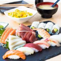 Sushi And Sashimi Combination · Tuna avocado roll, 8 pieces of sushi and 12 pieces of sashimi. Served with ginger salad and ...