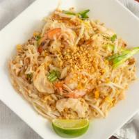 Pad Thai · Famous Thai noodle dish, shrimps, chicken & noodle stir-fried with ground peanut, egg, bean ...