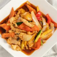 Chicken Tropical · Spicy. Sauté of sliced chicken breast with roasted cashew nuts, red peppers, mushrooms, zucc...