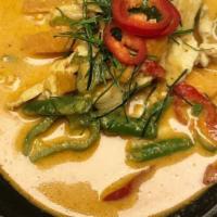 Panang Curry · Spicy. A popular dish with meat in our homemade curry peanut sauce.