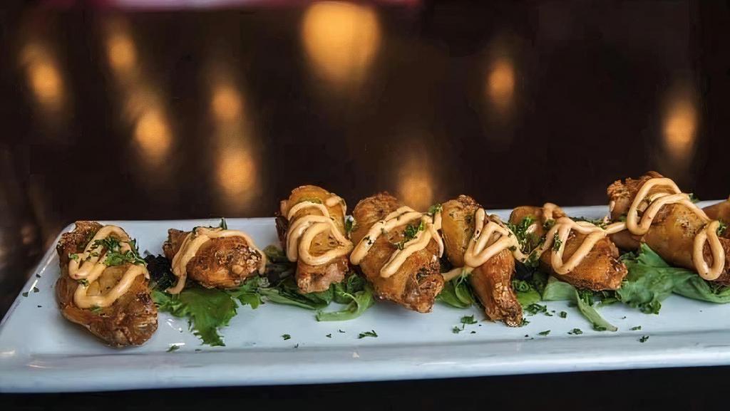 Duck Fat Fried Chicken Wings · Classic chipotle aioli, buffalo, sweet chili, or gold fever style.