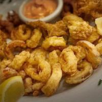 Fried Calamari · Comes with cherry peppers and chipotle aioli on the side.