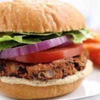Veggie Burger · Black bean burger, lettuce, tomato, toasted brioche. Choice of two sides