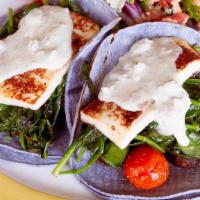 Malibu · Wild mushroom, queso fresco, sautéed spinach, hatch chili ranch, blue corn tortillas