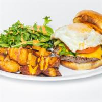 Breakfast Burger · Fresh halal beef burger, over easy egg, 26 aioli, arugula, tomato, on a toasted brioche bun....