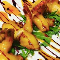 Wild Shrimp - Dragon Style · Tempura fried, sweet & spicy scotch bonnet mango glaze.
