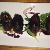 Prosciutto Wrapped Dates · Stuffed with gorgonzola and pan seared.