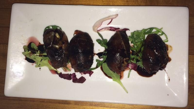 Prosciutto Wrapped Dates · Stuffed with gorgonzola and pan seared.