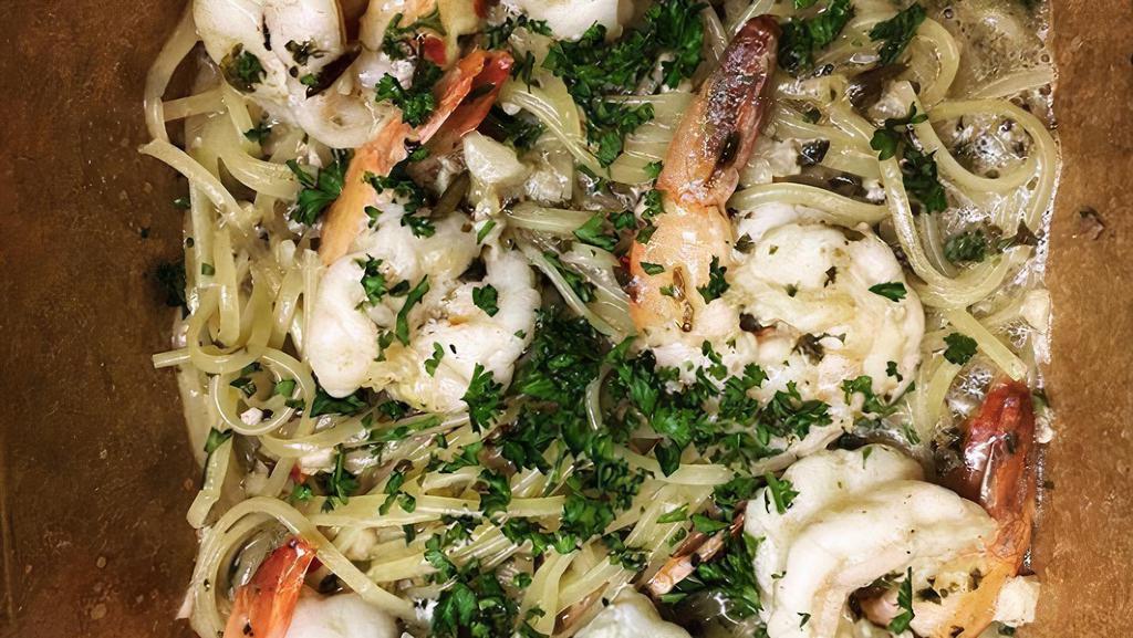 Shrimp Scampi · Sautéed with fresh lemon, garlic, herbs, butter & EVOO over linguini.