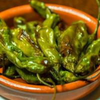 Pimientos Del Padrón · Fried shishitos peppers, extra virgin olive oil, and flake salt.