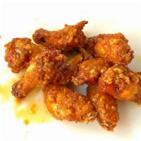 Garlic Bomb Wings (8 Pc) · 8 piece wings tossed in our garlicky bomb sauce!