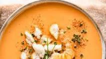 Seafood Bisque · Homemade seafood bisque with clams, shrimps, lobster and onions.