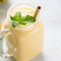 Mango Lassi · Alphonso mango pulp blended with yogurt and served with a straw for the brave.