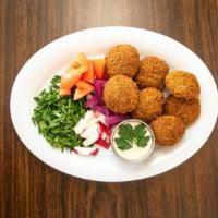 Falafel  · Vegetarian. Fried ground chickpeas & fava beans. Consuming raw or undercooked meats, poultry...