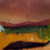 Cheeseburger 8Oz · House dust / torched extra sharp american cheese / brioche bun