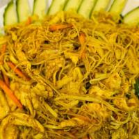 Singapore Style Rice Noodle · Angel hair rice noodles with chicken and vegetables sauteed with curry and spice.