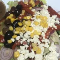 Chef Salad · House salad with ham, turkey and American cheese.