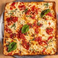 Brooklyn Pizza · Thin crust square with cheese on the bottom & sauce on top