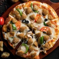 Falafel Pizza · Homemade dough topped with fresh falafel, onions, green peppers and black olives, with your ...