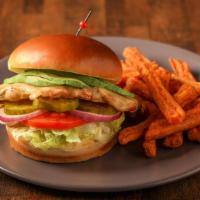 Grilled Chicken Sandwich · Juicy grilled chicken breast fillet served with lettuce, tomato and onion on a brioche bun w...