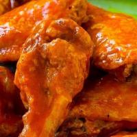 Spicy Buffalo Wings · Spicy. 8 pieces. Served with French fries.
