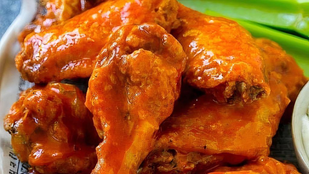 Spicy Buffalo Wings · Spicy. 8 pieces. Served with French fries.