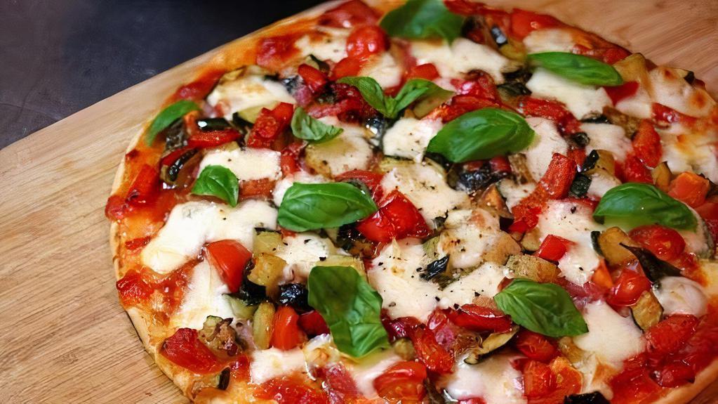 Margharita Pizza · Fresh mozzarella, tomato sauce and fresh basil.
