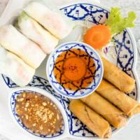 Combo Roll · 4 PIECE OF THAI ROLL, 4 PIECE OF FRESH SPRING ROLL, W/SWEET & SOUR SAUCE.