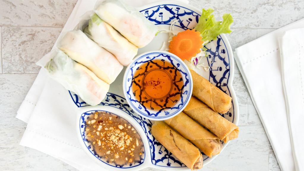 Combo Roll · 4 PIECE OF THAI ROLL, 4 PIECE OF FRESH SPRING ROLL, W/SWEET & SOUR SAUCE.