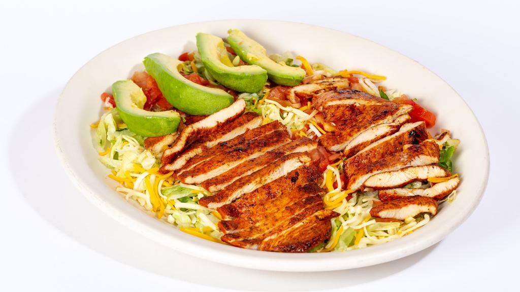 Grilled Chicken Salad · A bed of fresh lettuce, tomatoes, cheese and slices of avocado with grilled chicken breast. Served with your choice of dressing.