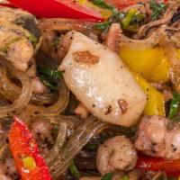 Seafood Combination · Jumbo shrimp, lobster, scallops and crabmeat sauteed with mixed vegetables. Served with whit...