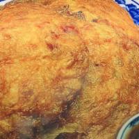Roast Pork Egg Foo Young · Served with gravy and white rice.