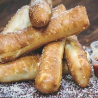 Really Big Bread Sticks · Brushed with homemade garlic butter, sprinkled with garlic salt and aged parmesan.