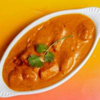 Chicken Tikka Masala ￼ · Creamy tomato curry with chunks of boneless chicken.