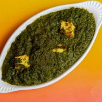 Saag Paneer · Fresh creamed spinach with chunks of paneer.