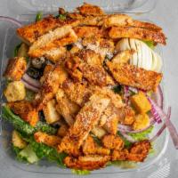 Grilled Chicken Caesar Salad · Romaine lettuce, Parmesan and croutons. Served with lettuce, tomatoes, cucumbers, onions, gr...