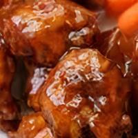 Tropic Thunder Appetizer · Boneless wings tossed in Mumbo Sauce, served with carrots, celery and ranch or blue cheese d...