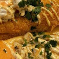 Catfish & Grits · Deep fried catfish with jumbo lump crab meat topped with creamy cheddar grits with Old Bay a...