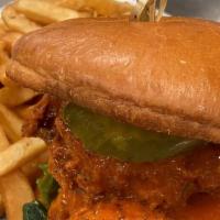 Fried Chicken Sandwich · Buttermilk fried chicken thighs tossed in your choice of Buffalo or Hot Honey sauce with let...