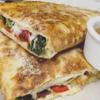 East Side Panini · House made chicken cutlets, broccoli rabe, roasted peppers, mozzarella cheese on our house p...