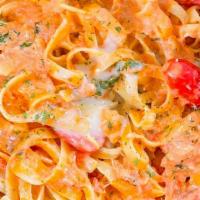 Crab Valentino · Jumbo lump crab meat, cherry tomatoes, spinach tossed in our rosa vodka sauce served over fe...