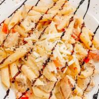 Chicken Bruschetta · Penne pasta tossed in our house alfredo topped with fresh house tomato bruschetta, grilled c...