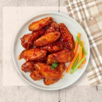 Buffalo Bliss Wings · Fresh chicken wings breaded, fried until golden brown, and tossed in buffalo sauce.