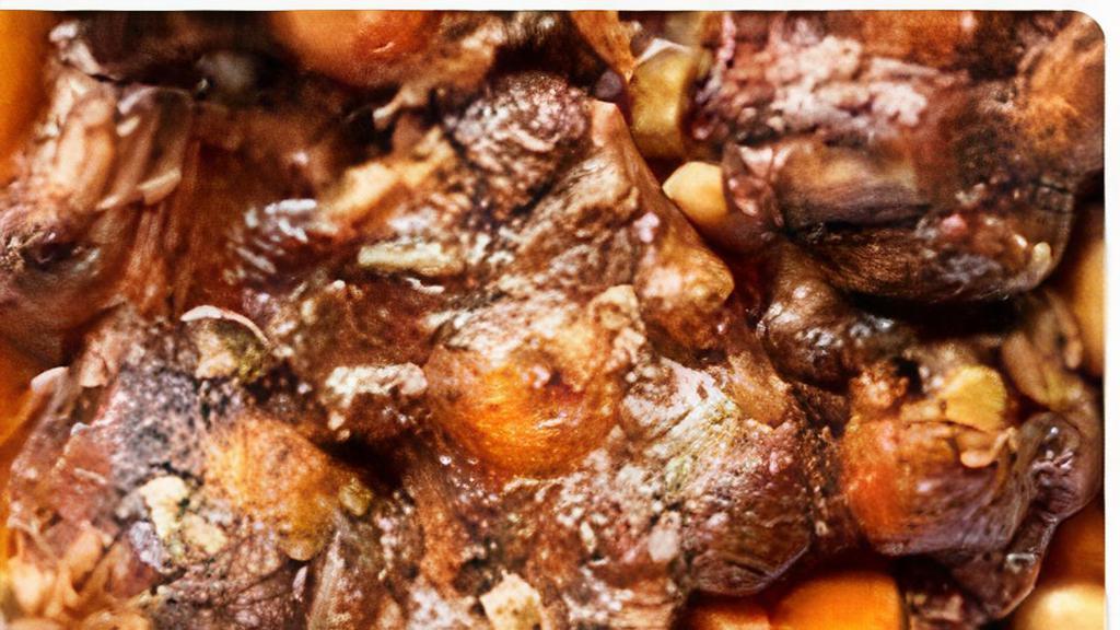 Oxtail · Oxtail is served over Rice and Peas or White Rice with Mixed Vegetables