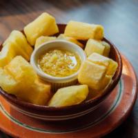 Yuca Frita · Fried yuca served with an assortment of homemade sauces included.