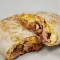 Breakfast Burrito · Flour tortilla stuffed with scrambled free range eggs, home fires, cheddar cheese, and choos...