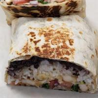 Fried Chicken Burrito · Flour tortilla stuffed with fried chicken breast, with your choice of beans and rice,  chees...