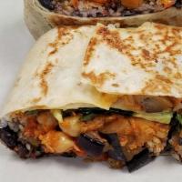 Veggie Burrito · Flour tortilla stuffed with sauteed mushrooms, grilled eggplant, chickpeas, peppers, onions,...