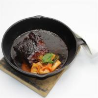 Skillet Short Rib · Slow-braised 5-hour beef rib, Asian five spice bbq sauce.