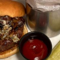 Fatmoon Burger · Grilled black angus beef, sauteed local exotic mushrooms, caramelized onion, jasper blue che...
